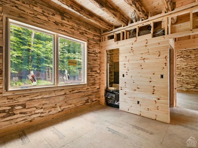 a view of walk in closet with window