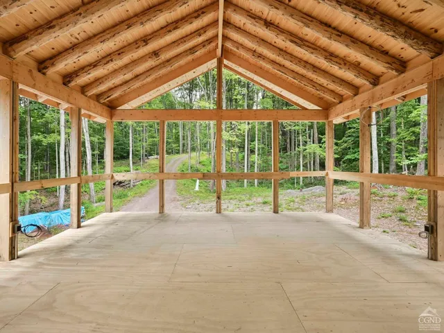 a view of a house with a window and the side of a house