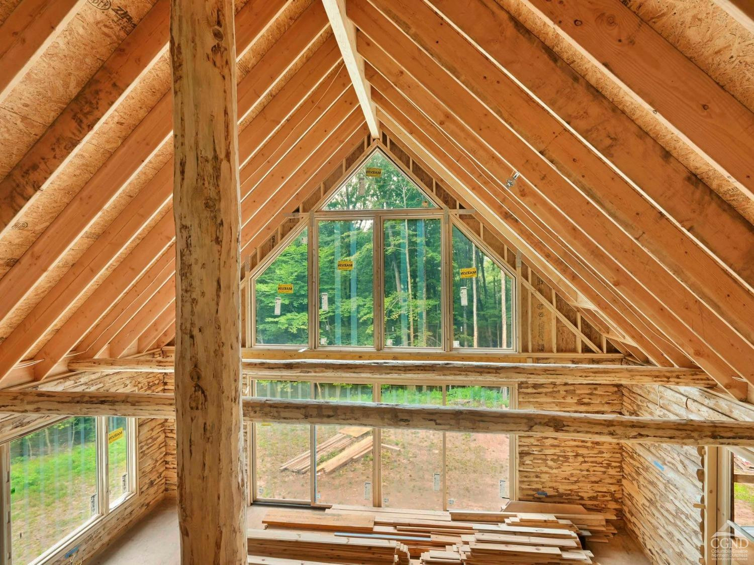 2731 County Route 10 Windham, NY 12496 - Photo 17 of 31 a view of a house with a window and the side of a house