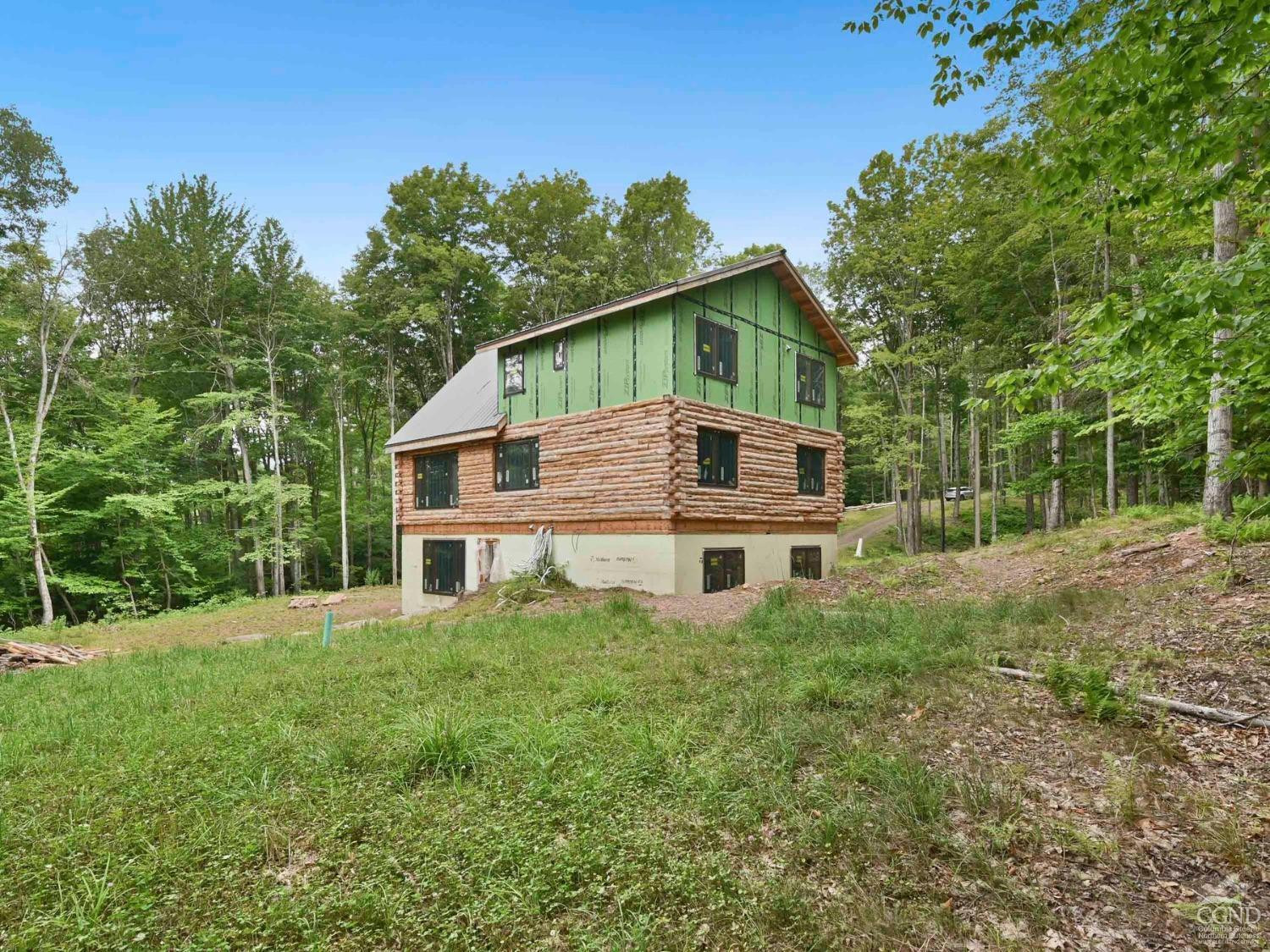 2731 County Route 10 Windham, NY 12496 - Photo 22 of 31 a house view with a garden space