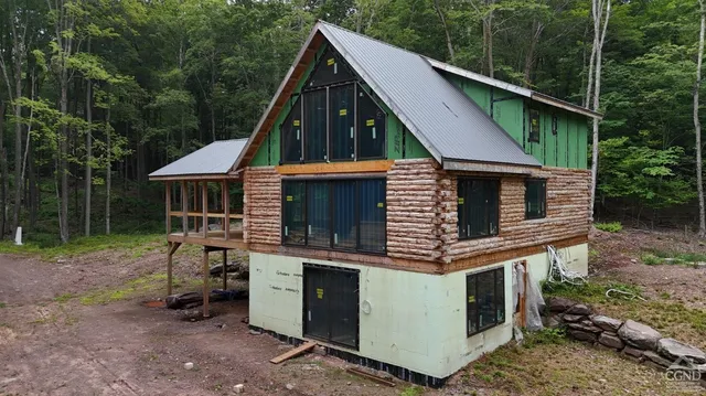 a view of a small deck in front of a house