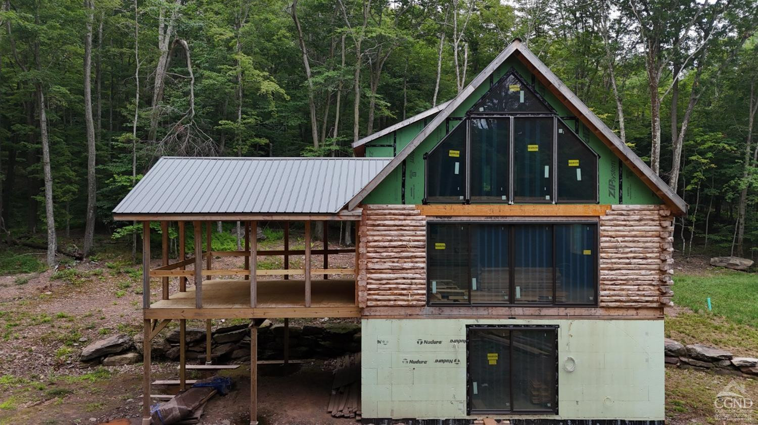 2731 County Route 10 Windham, NY 12496 - Photo 28 of 31 a front view of a house with sitting area