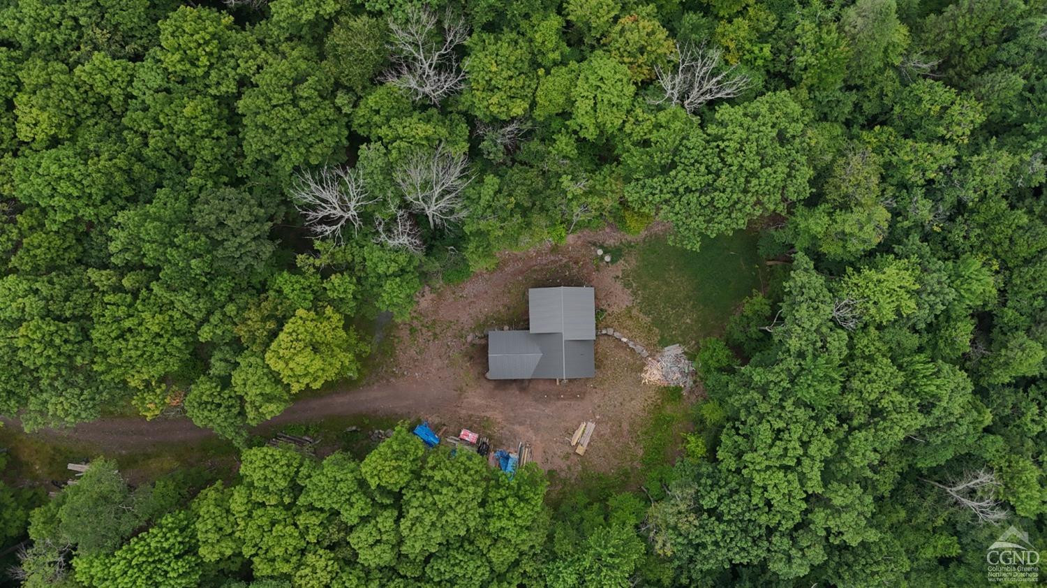2731 County Route 10 Windham, NY 12496 - Photo 29 of 31 an aerial view of a house with a yard