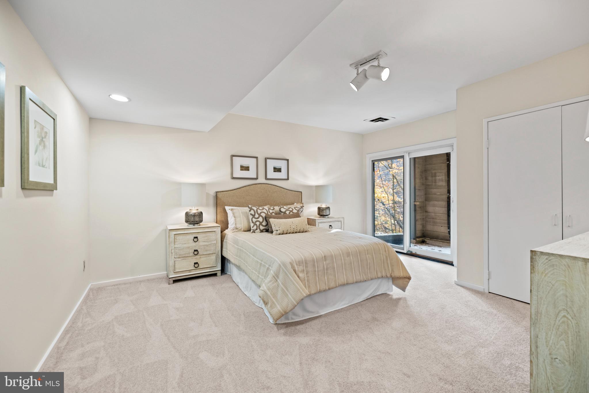 2601 Klingle Road Northwest Washington, DC 20008 - Photo 30 of 59 Spacious bedroom with access to lower patio!
