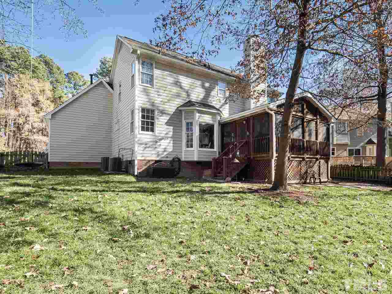12105 North Exeter Way Raleigh, NC 27613 - Photo 27 of 27 front view of a house with a yard