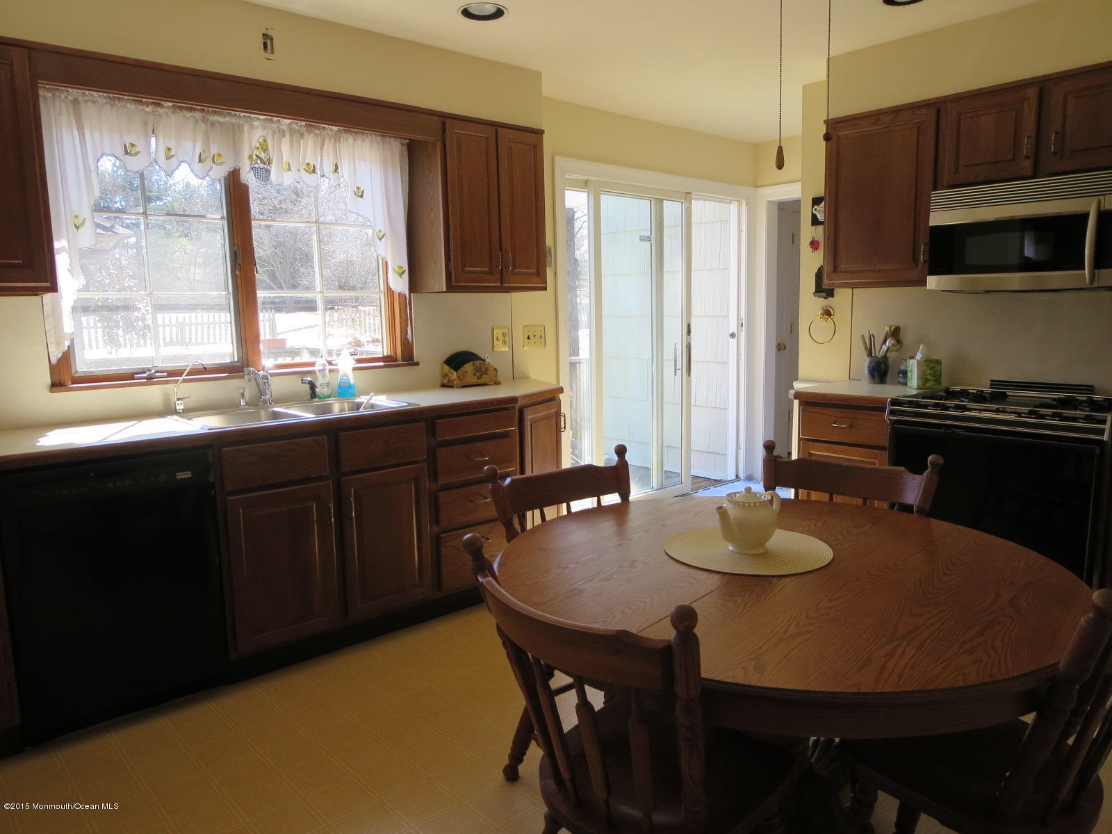 31 Bittner Road Perrineville, NJ 08535 - Photo 10 of 18 KITCHEN TOWARD SLIDER TO DECK