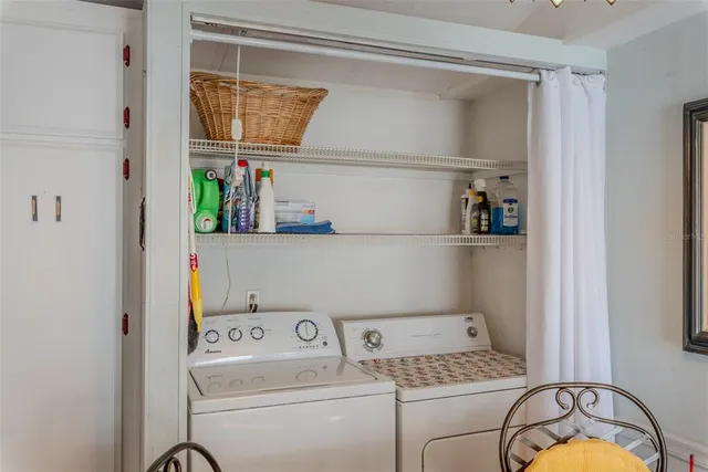 a bathroom with a sink mirror and toilet