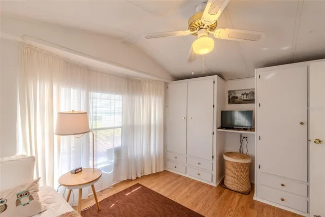 a front view of a house with a yard garage and outdoor seating