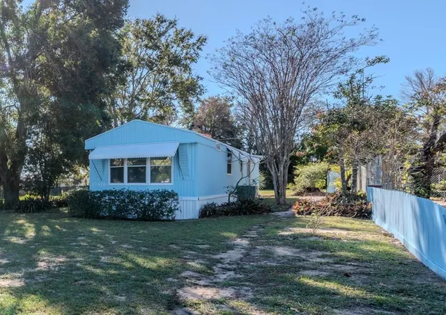 an aerial view of residential building with parking space