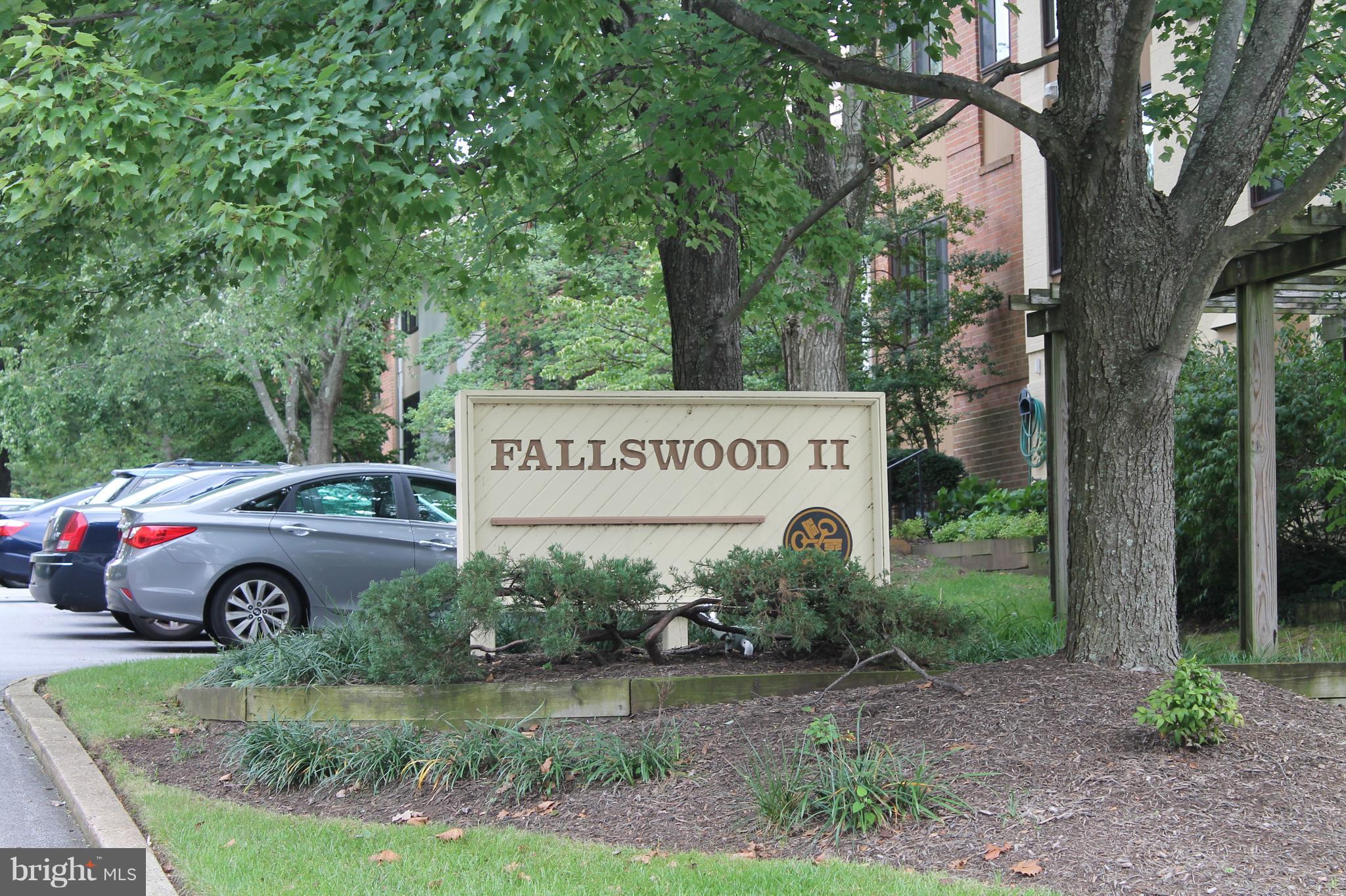 23 Hamill Road, Unit 23F Baltimore, MD 21210 - Photo 2 of 11 a view of a car park next to a road