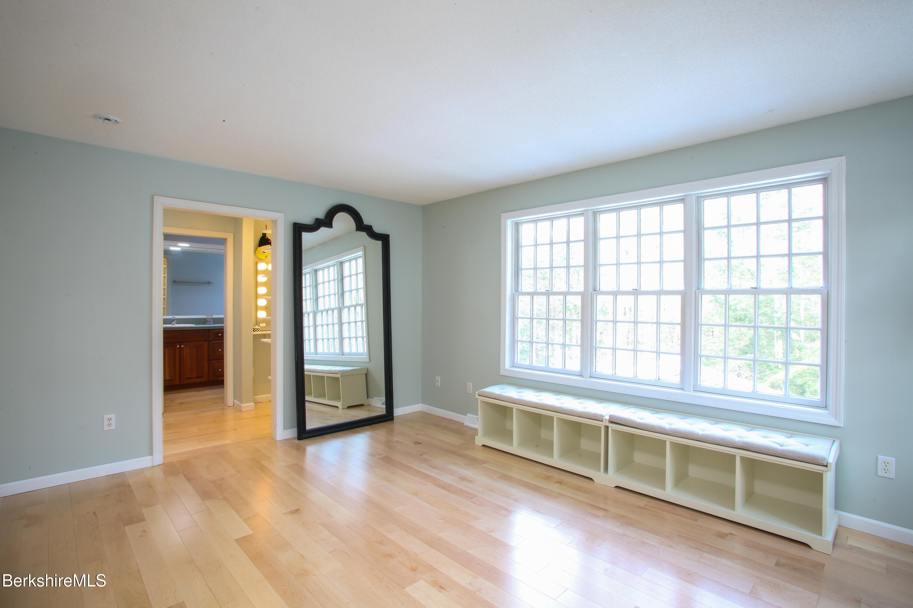 751 Park Hill Road Northampton, MA 01062 - Photo 22 of 45 an empty room with wooden floor and windows