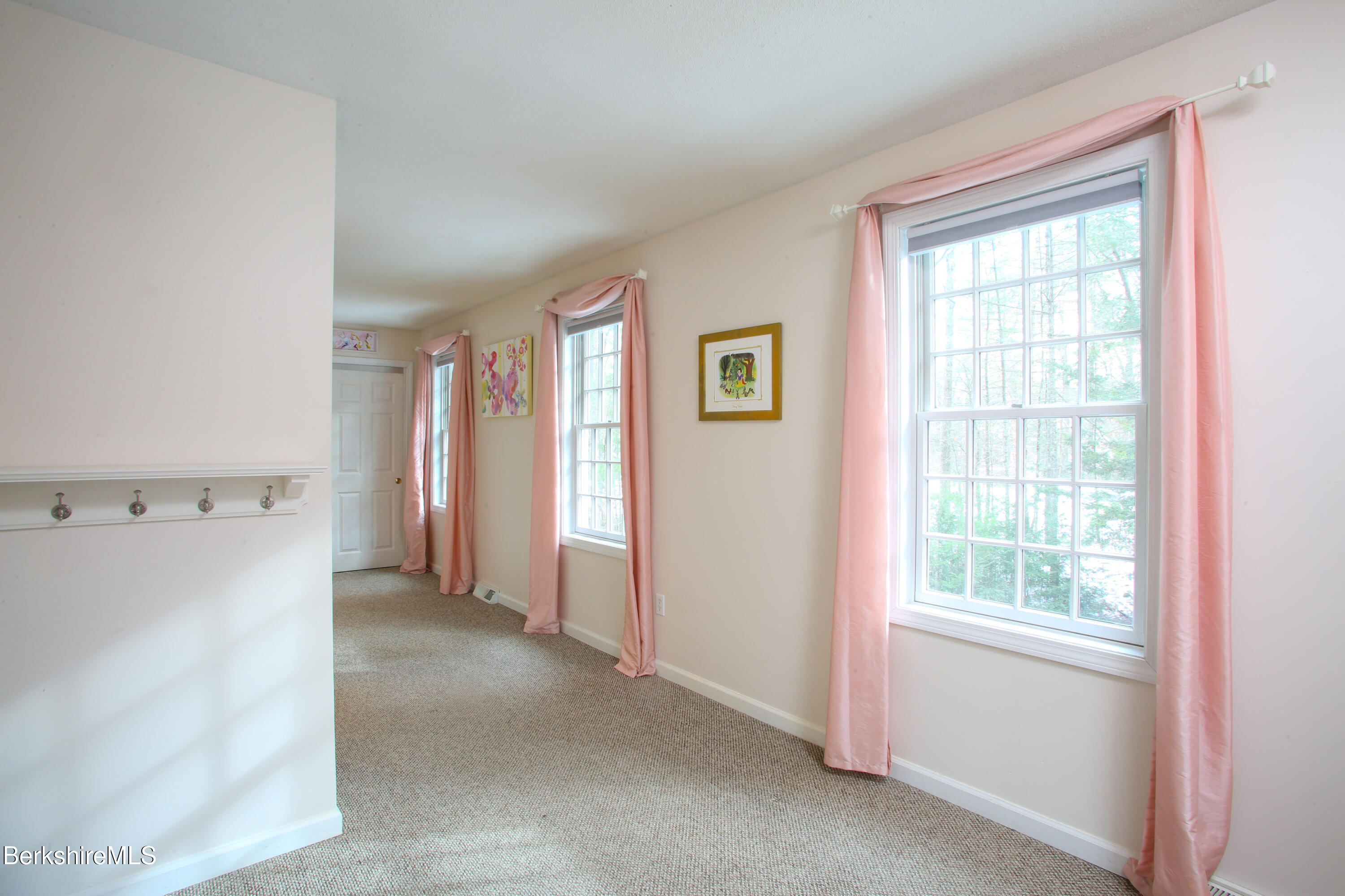 751 Park Hill Road Northampton, MA 01062 - Photo 27 of 45 a view of a livingroom with an empty space and a window