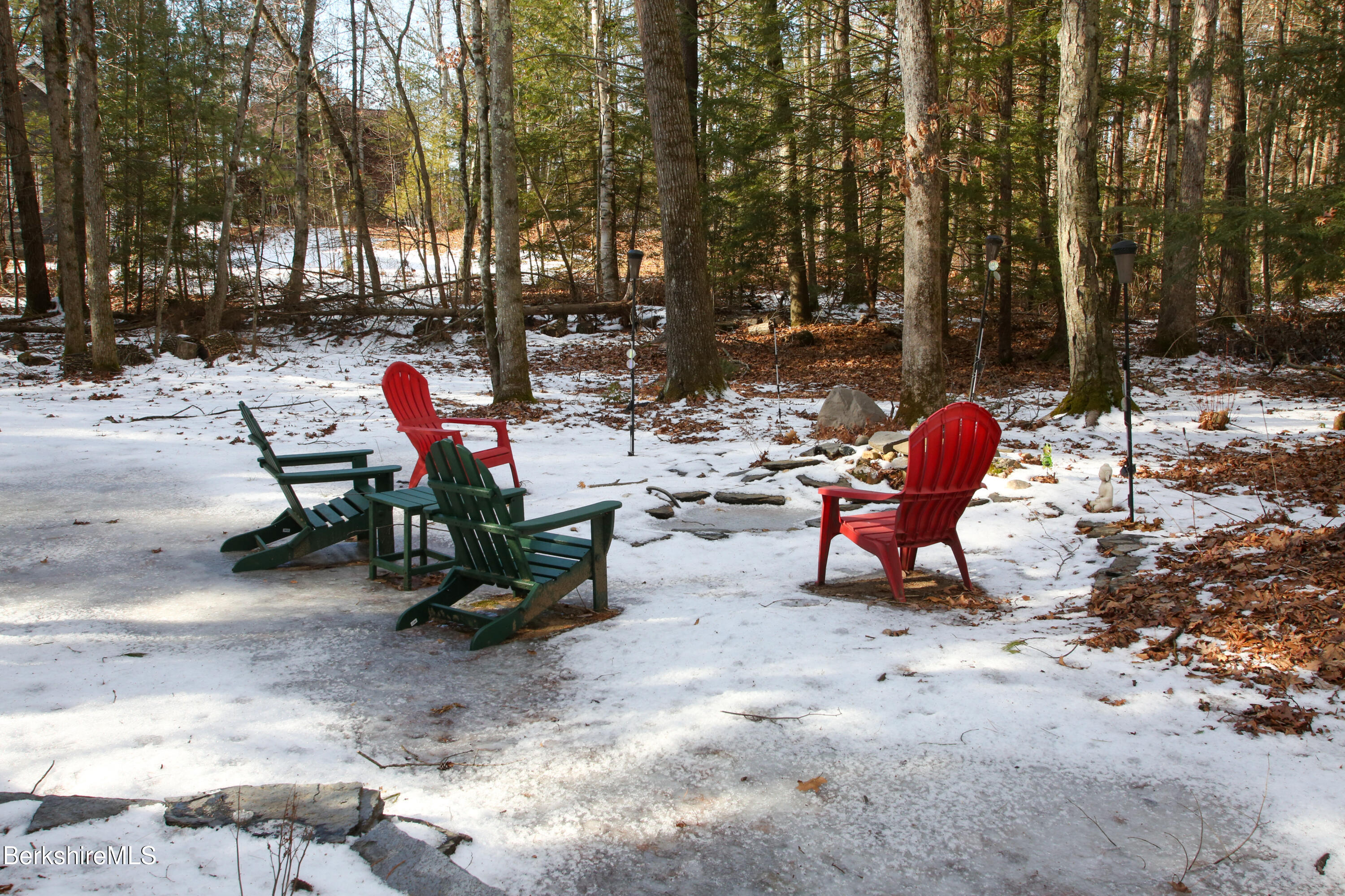 751 Park Hill Road Northampton, MA 01062 - Photo 38 of 45 a view of a backyard with a bench and chairs