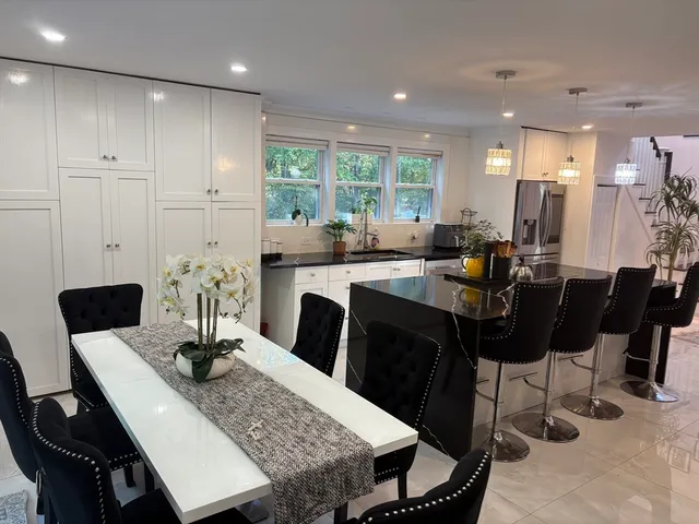 a view of a dining room with furniture