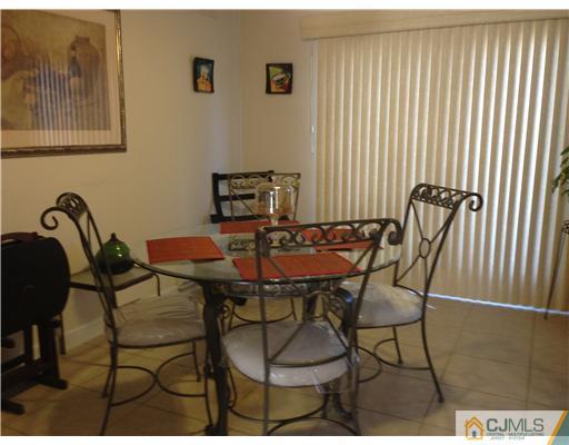 462 A Delair Road Monroe Township, NJ 08831 - Photo 5 of 10 a view of a dining room with furniture and window