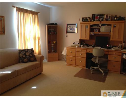 462 A Delair Road Monroe Township, NJ 08831 - Photo 7 of 10 a livingroom with workspace and a window