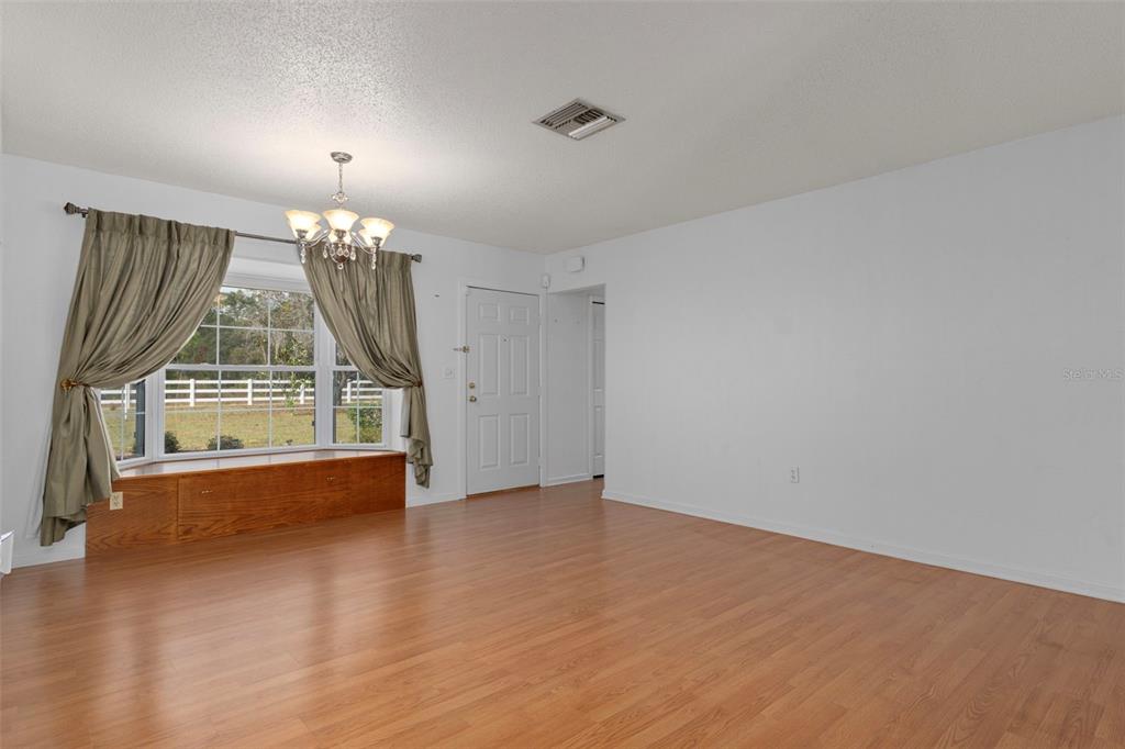 649 Southwest Bend Point Lecanto, FL 34461 - Photo 15 of 50 a view of empty room with wooden floor