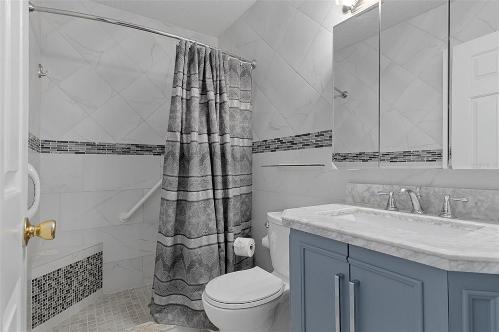 649 Southwest Bend Point Lecanto, FL 34461 - Photo 27 of 50 a bathroom with a sink a toilet and shower