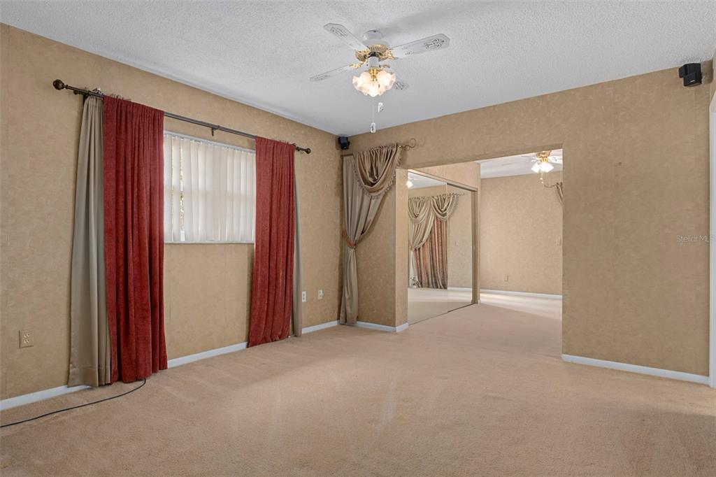 649 Southwest Bend Point Lecanto, FL 34461 - Photo 28 of 50 a view of a chandelier fan and closet area