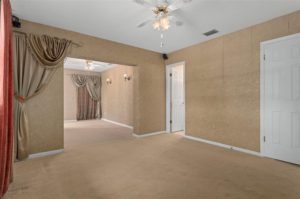 649 Southwest Bend Point Lecanto, FL 34461 - Photo 29 of 50 a view of a hallway with a chandelier fan