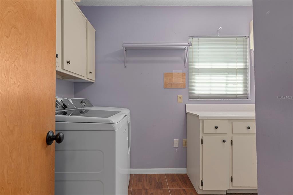 649 Southwest Bend Point Lecanto, FL 34461 - Photo 34 of 50 a bathroom with a sink a toilet and vanity