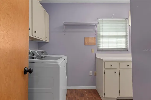 a view of a hallway with some storage area