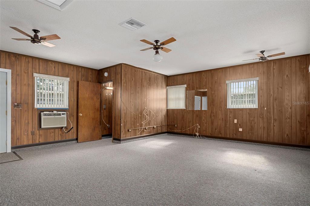 649 Southwest Bend Point Lecanto, FL 34461 - Photo 39 of 50 a view of an empty room with a ceiling fan