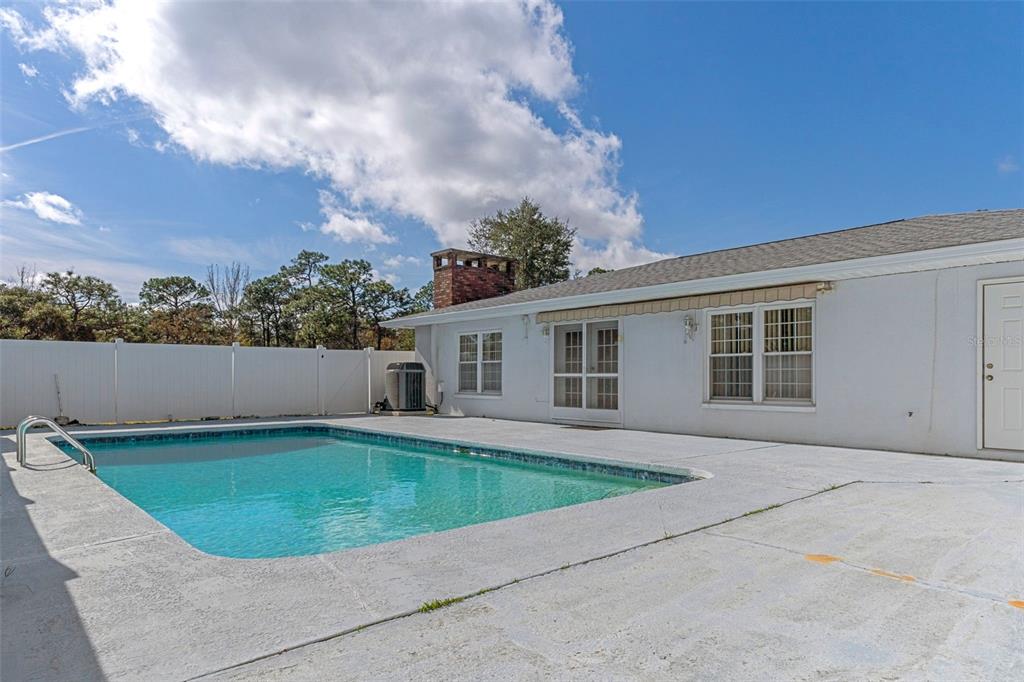 649 Southwest Bend Point Lecanto, FL 34461 - Photo 42 of 50 front view of a house with a patio