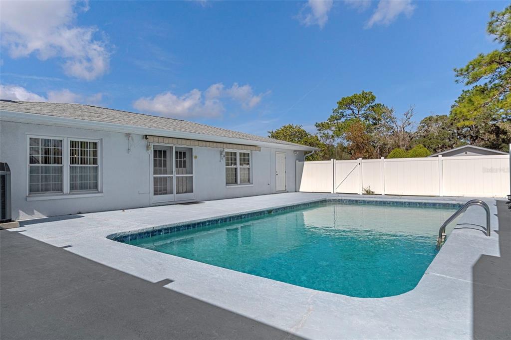 649 Southwest Bend Point Lecanto, FL 34461 - Photo 43 of 50 a view of a house with a swimming pool