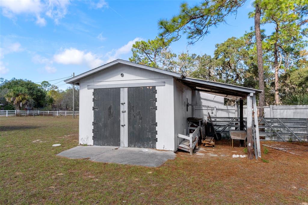 649 Southwest Bend Point Lecanto, FL 34461 - Photo 46 of 50 a front view of a house with garden