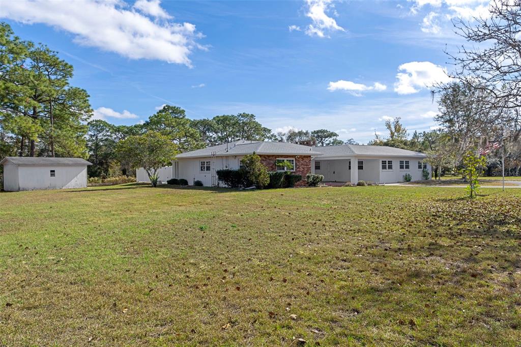 649 Southwest Bend Point Lecanto, FL 34461 - Photo 8 of 50 a front view of a house with a yard