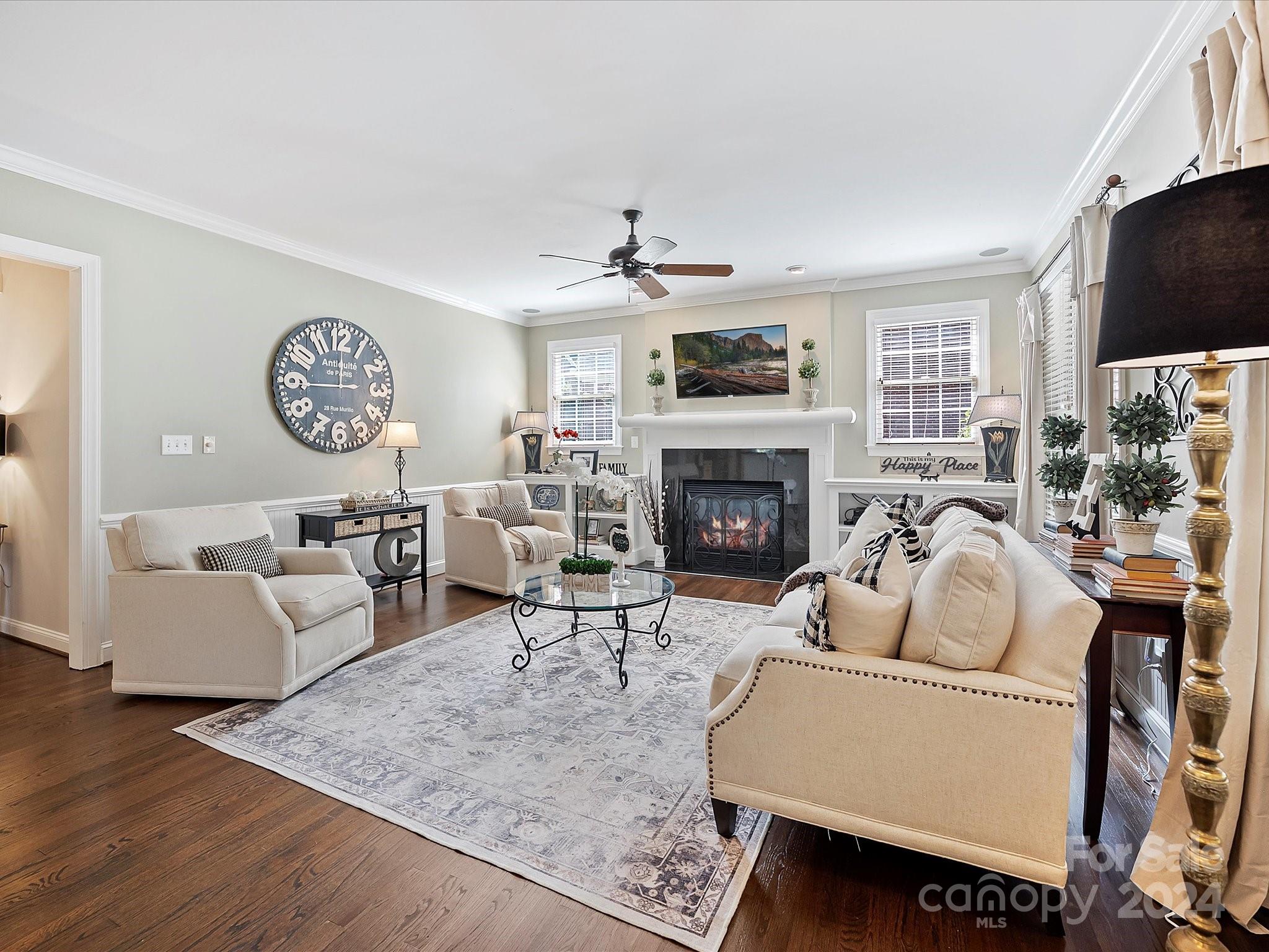 10309 Riesling Court Charlotte, NC 28277 - Photo 13 of 44 a living room with furniture a fireplace and a flat screen tv