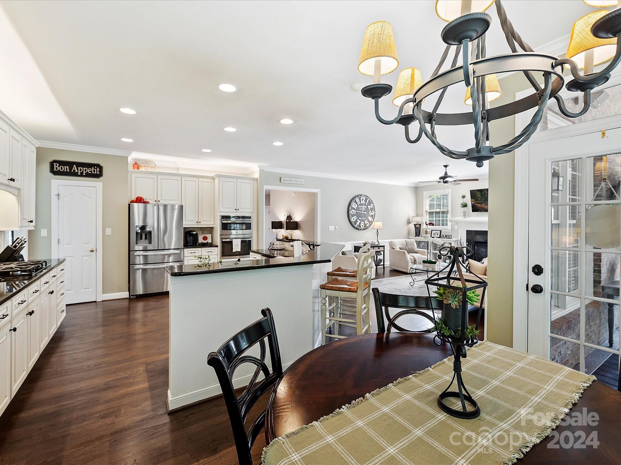 10309 Riesling Court Charlotte, NC 28277 - Photo 20 of 44 a view of a dining room with furniture