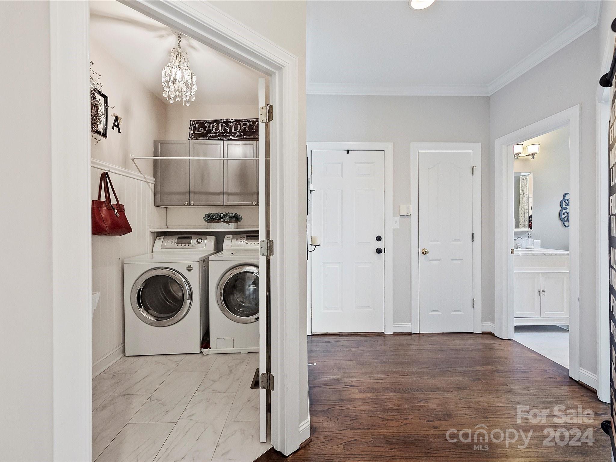 10309 Riesling Court Charlotte, NC 28277 - Photo 22 of 44 a view of a hallway with washer and dryer