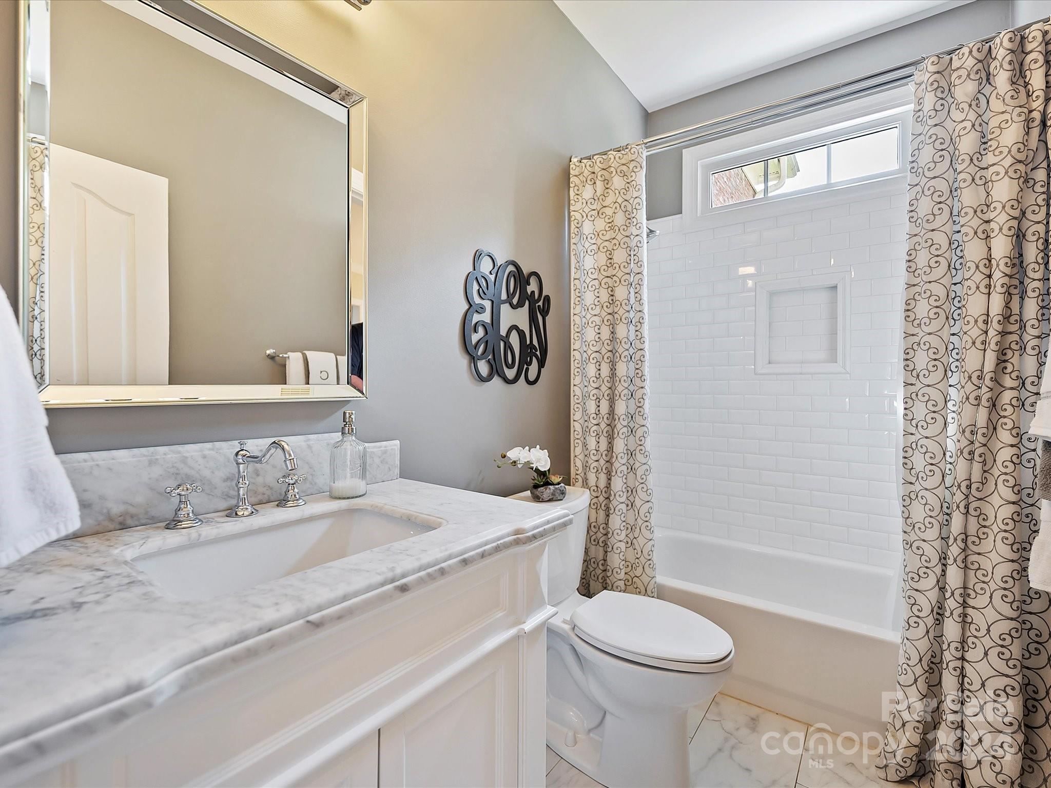 10309 Riesling Court Charlotte, NC 28277 - Photo 25 of 44 a bathroom with a sink toilet and shower