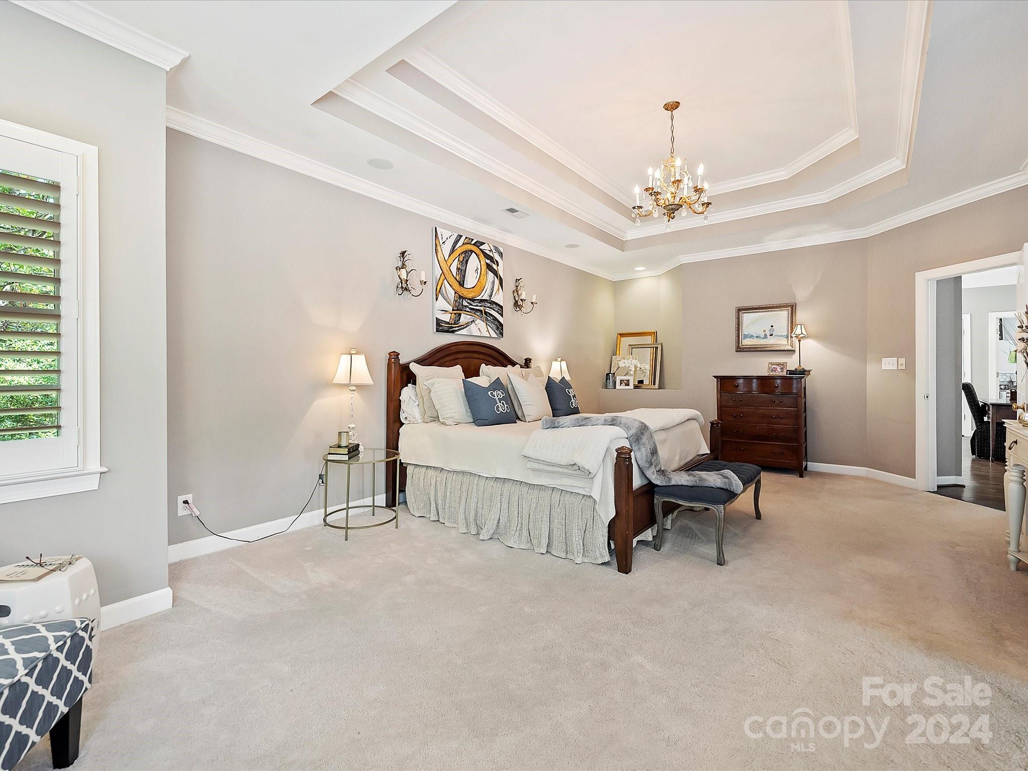 10309 Riesling Court Charlotte, NC 28277 - Photo 29 of 44 a bedroom with a bed couch and window