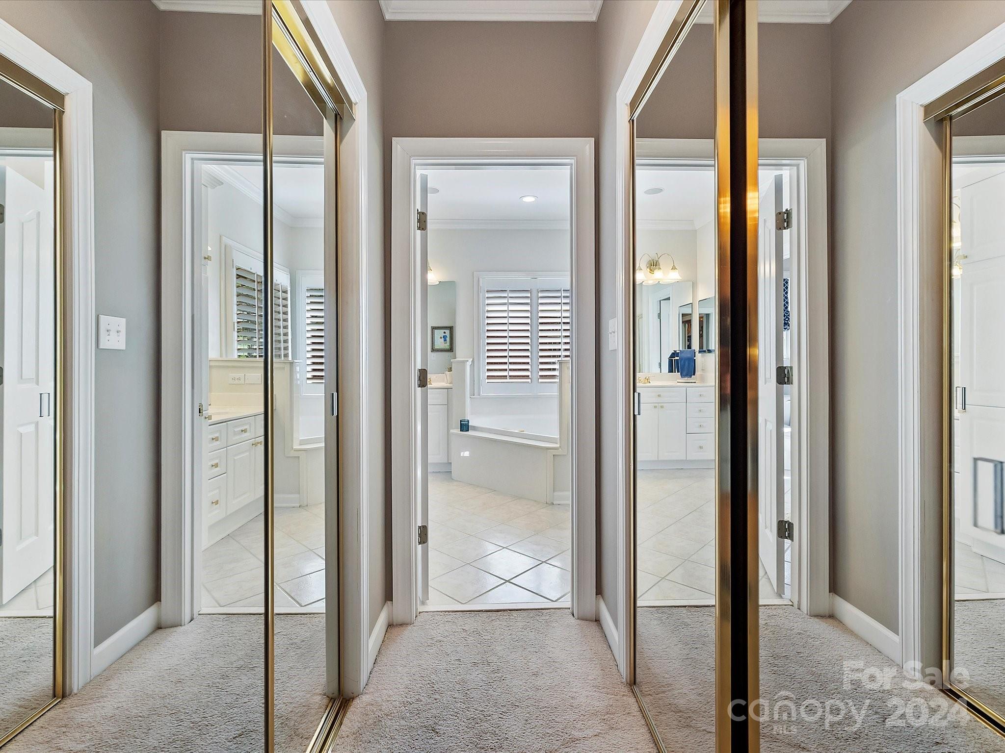 10309 Riesling Court Charlotte, NC 28277 - Photo 30 of 44 a view of a bathroom from a hallway