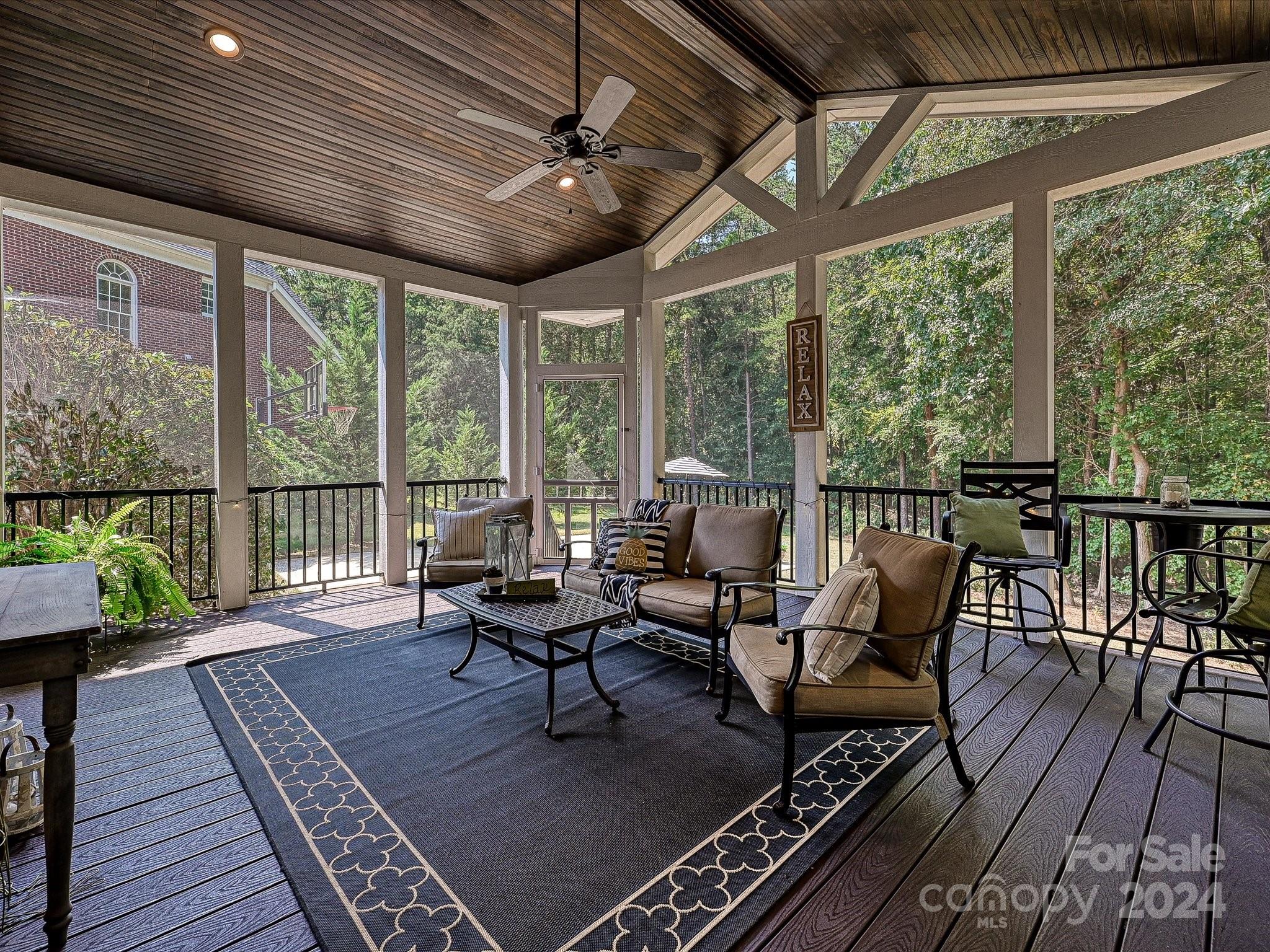 10309 Riesling Court Charlotte, NC 28277 - Photo 39 of 44 a balcony with wooden floor and outdoor seating