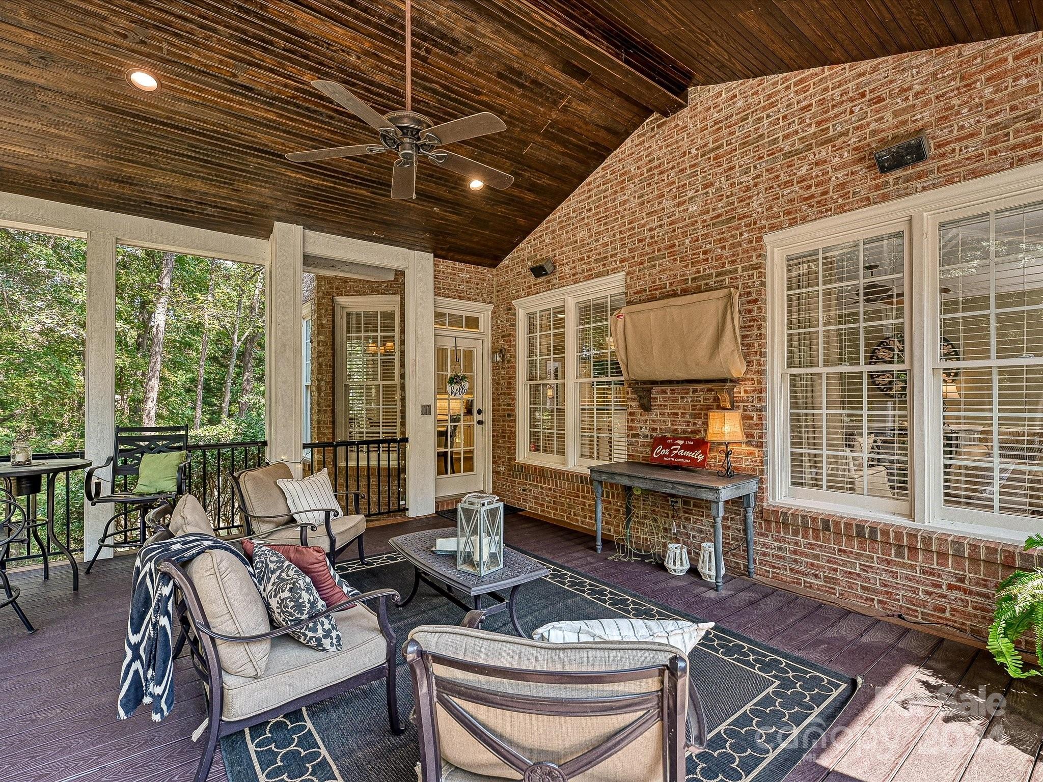 10309 Riesling Court Charlotte, NC 28277 - Photo 40 of 44 a living room with furniture and a fireplace