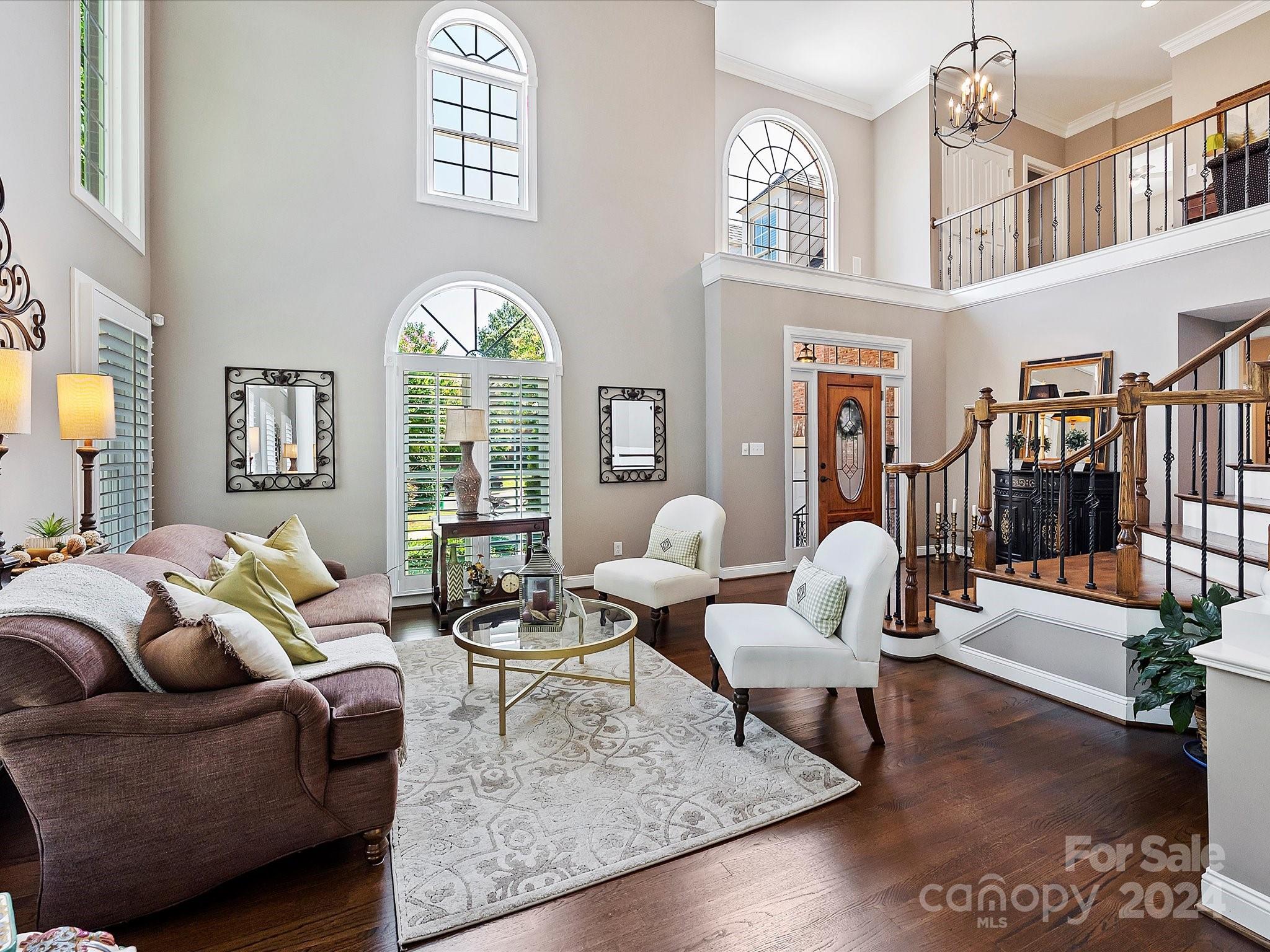 10309 Riesling Court Charlotte, NC 28277 - Photo 10 of 44 a living room with furniture fireplace and a large window