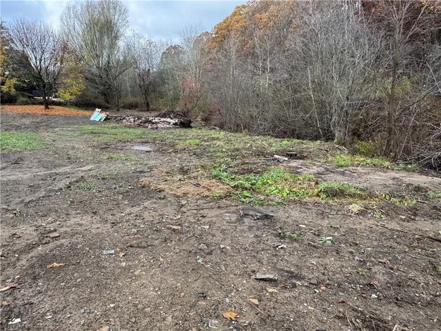 a fire hydrant in the middle of a field