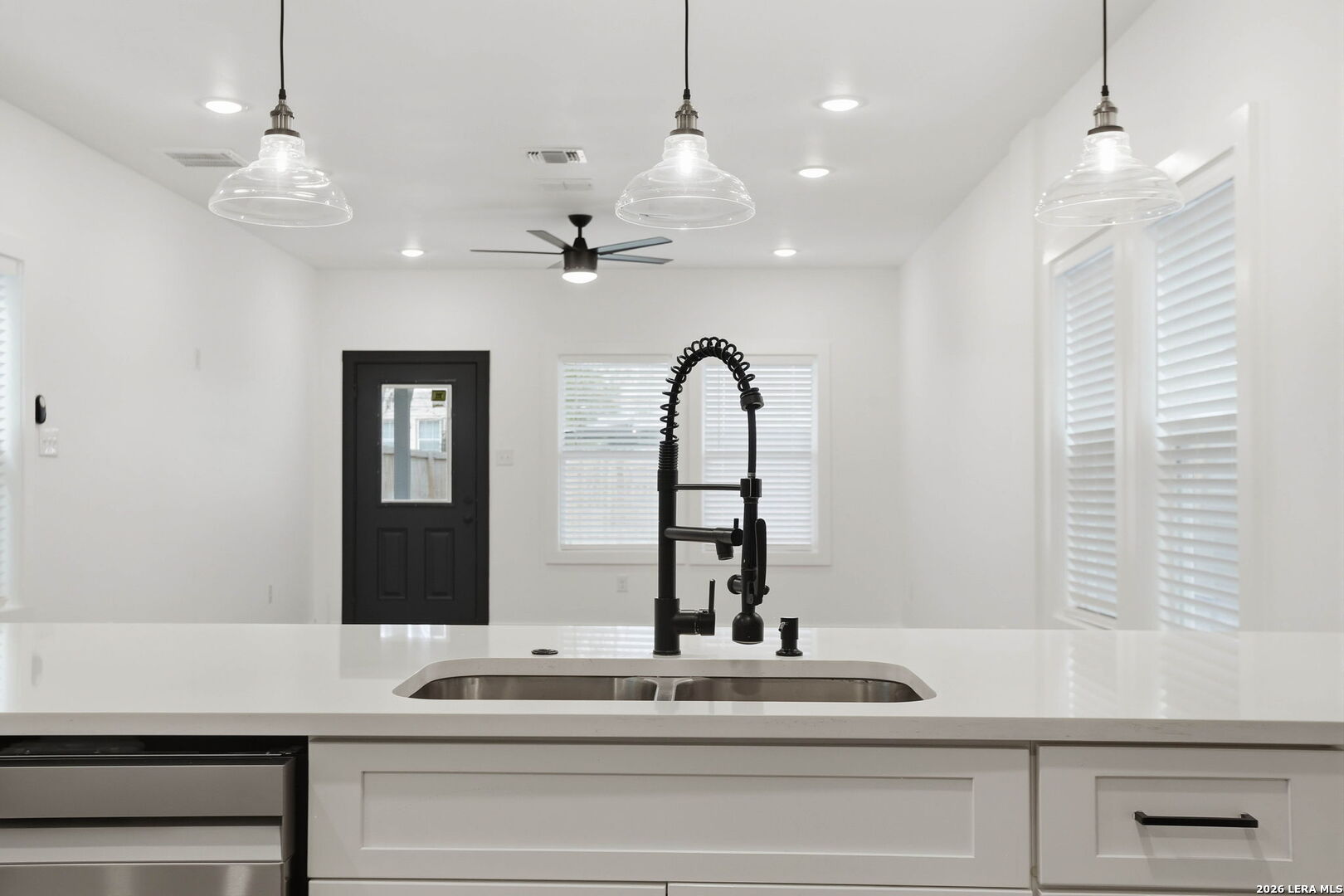 317 Porter Street San Antonio, TX 78210 - Photo 11 of 40 a open kitchen with kitchen island stainless steel appliances and living room view