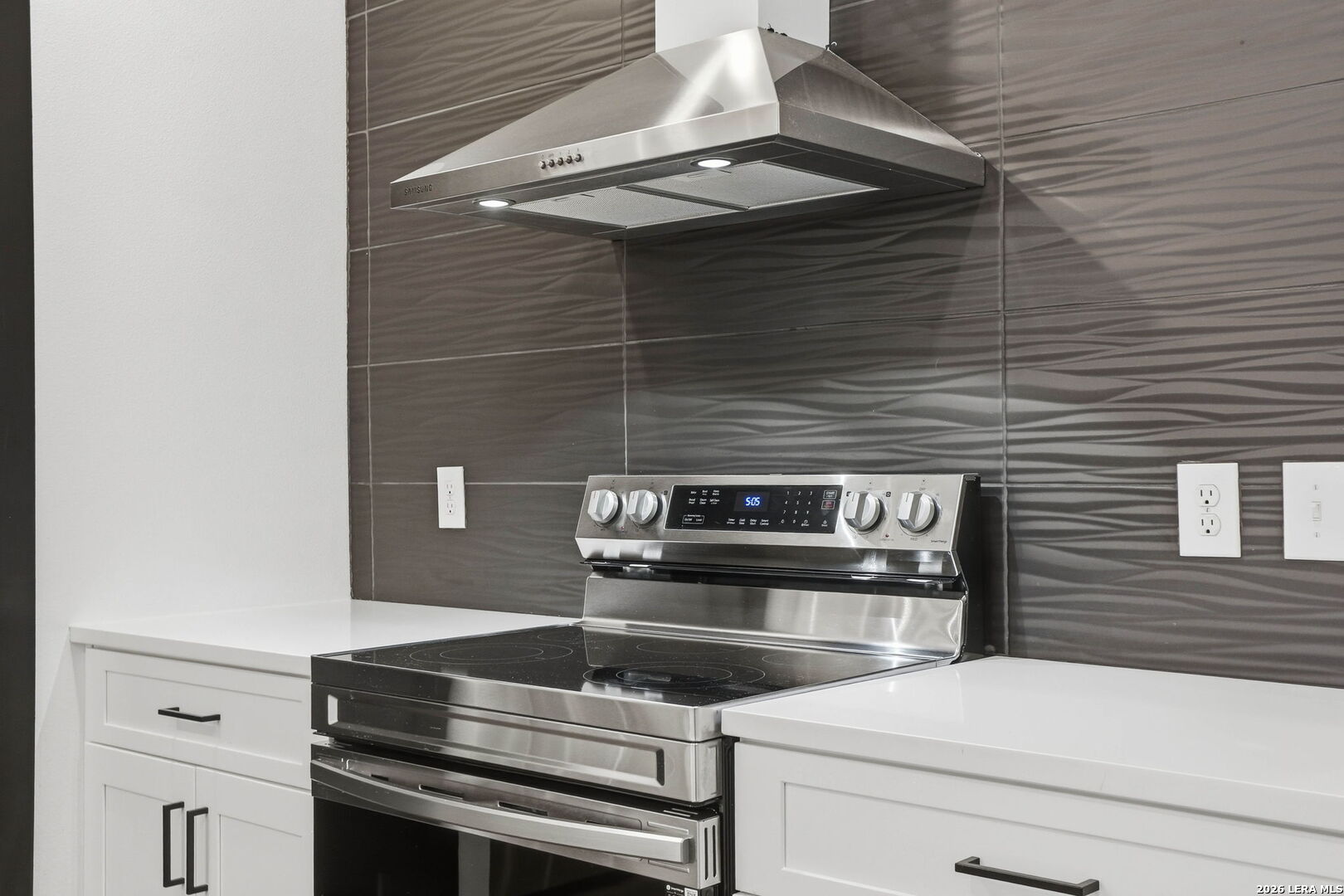317 Porter Street San Antonio, TX 78210 - Photo 12 of 40 a close view of stove top oven