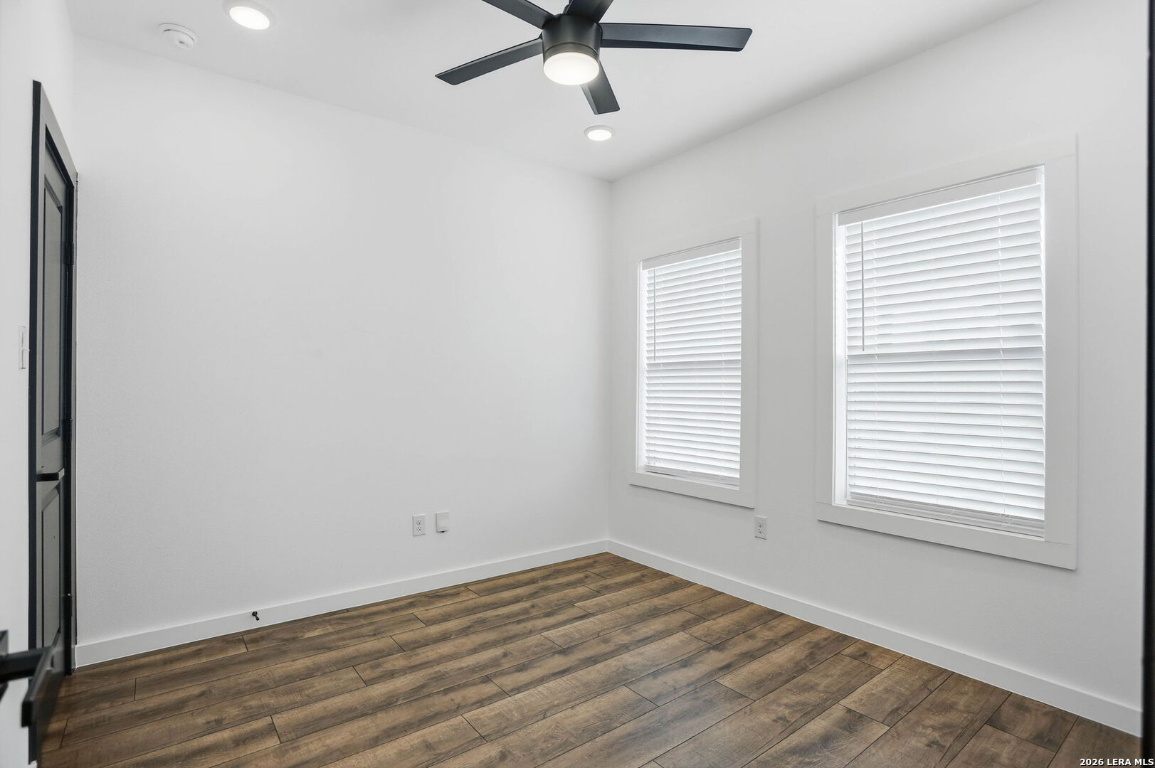 317 Porter Street San Antonio, TX 78210 - Photo 14 of 40 a view of a livingroom with a window and a ceiling fan