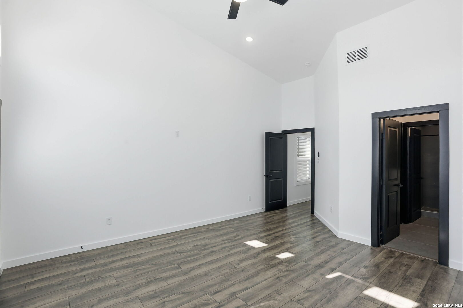 317 Porter Street San Antonio, TX 78210 - Photo 25 of 40 a view of an empty room with wooden floor