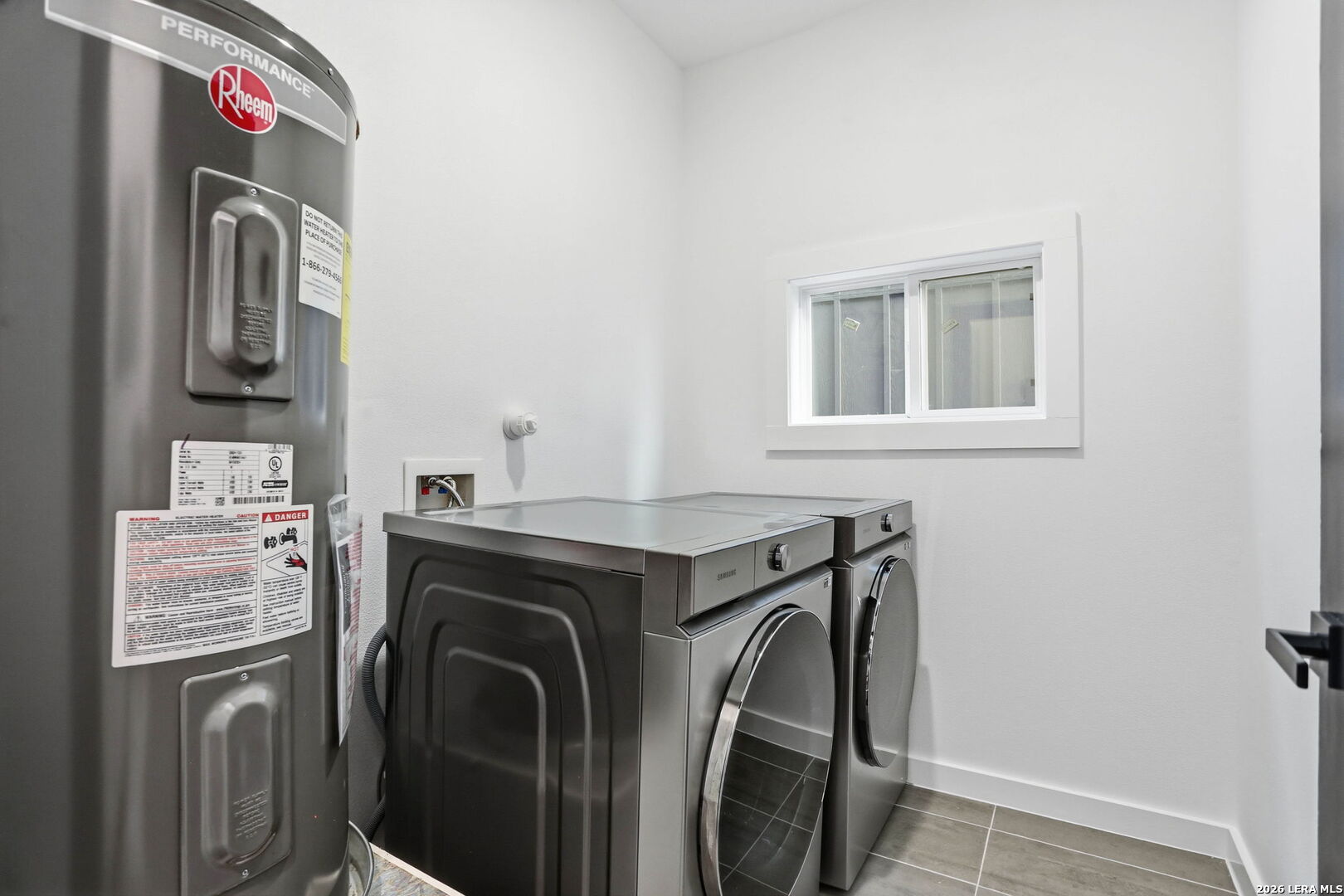 317 Porter Street San Antonio, TX 78210 - Photo 28 of 40 a utility room with dryer and washer