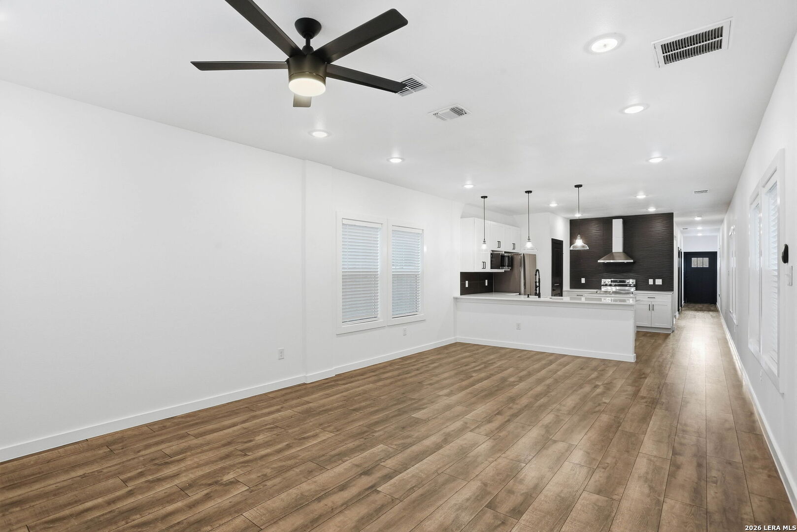 317 Porter Street San Antonio, TX 78210 - Photo 7 of 40 a view of kitchen with refrigerator microwave and stove