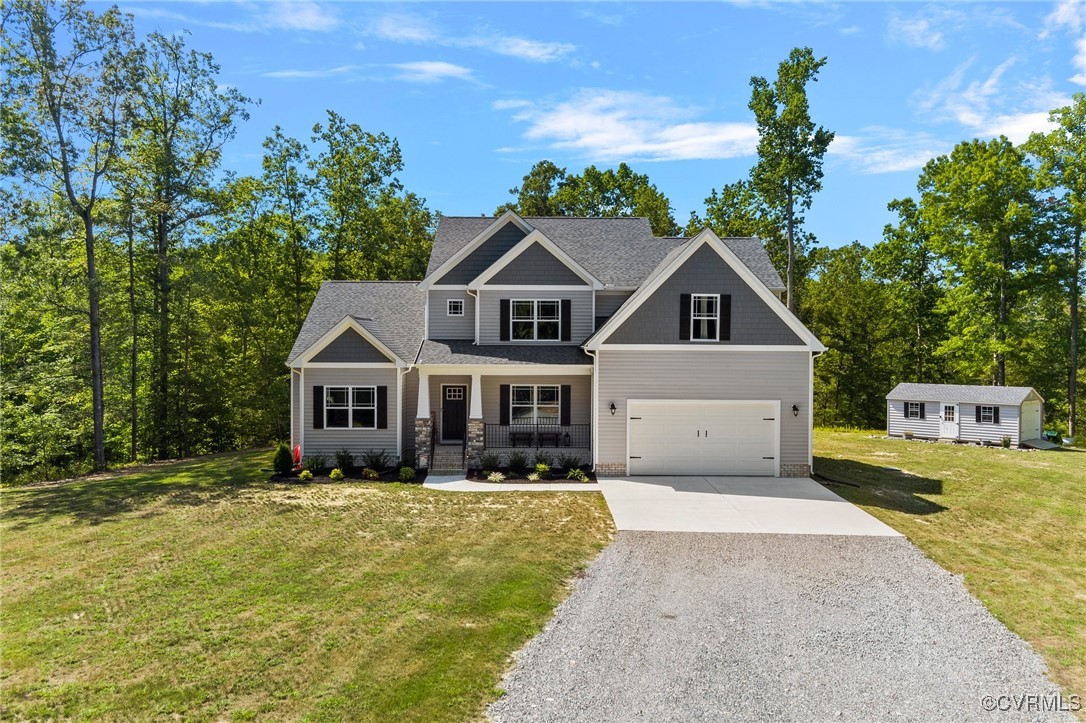 6509 Confederate Hill Drive Mechanicsville, VA 23111 - Photo 1 of 47 a front view of a house with a yard and trees