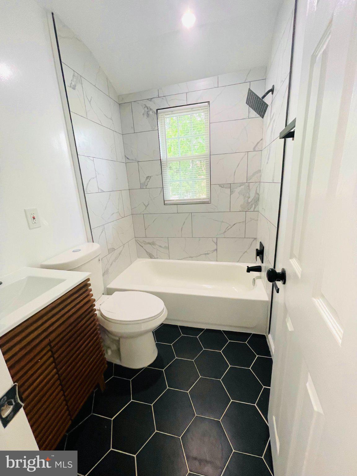 3449 23rd Street Southeast Washington, DC 20020 - Photo 5 of 8 Modern bathroom with sleek design.