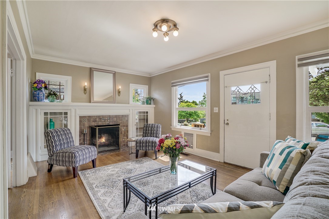 548 North 68th Street Seattle, WA 98103 - Photo 2 of 20 a living room with furniture and a fireplace